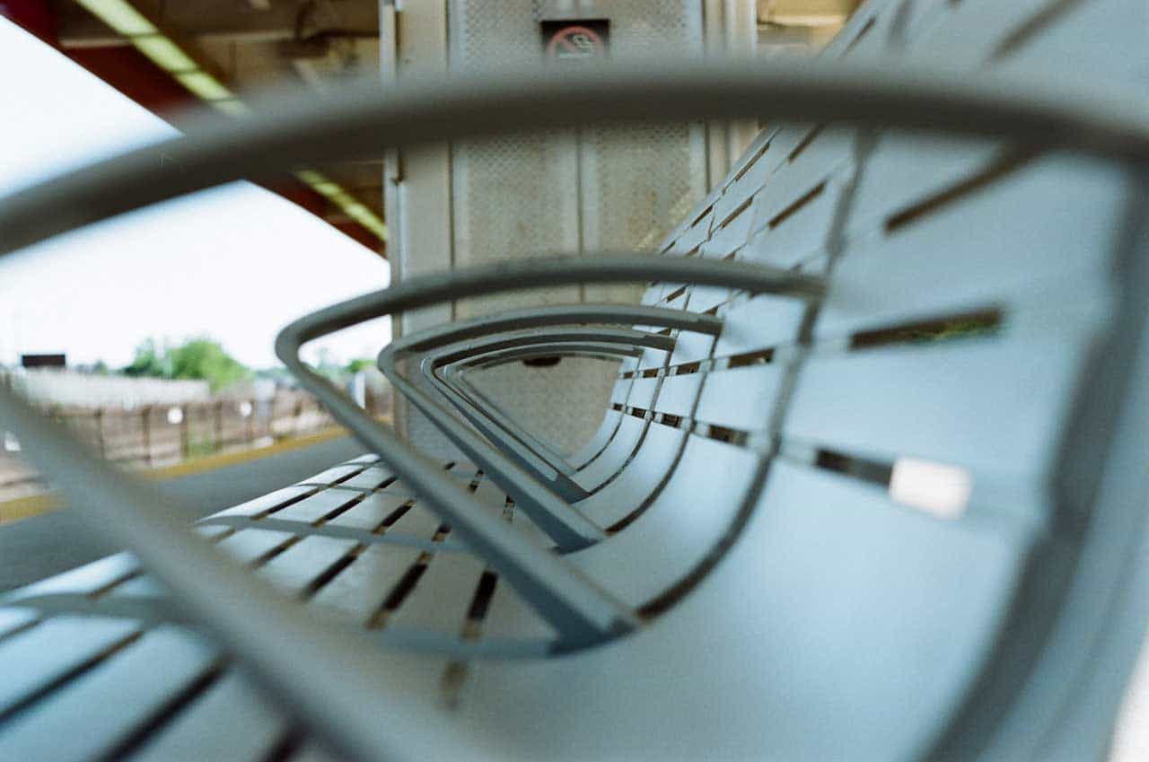 A bench with several armrests