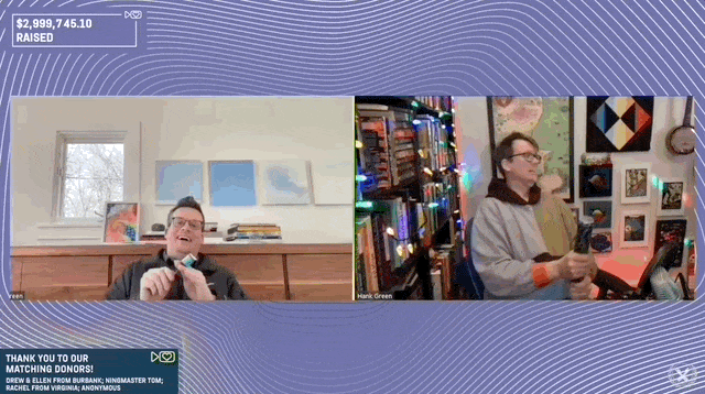 John and Hank Green pop confetti as the Project for Awesome reaches $3 million raised for charity
