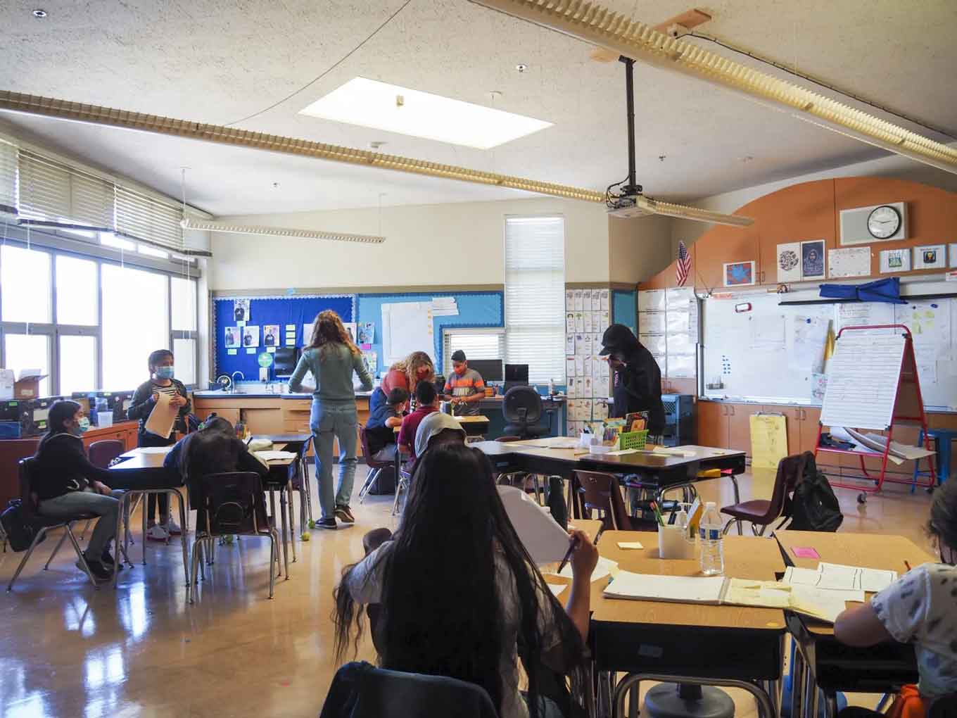 In May 2021, Think College Now elementary students sit in class after returning to in-person learning.