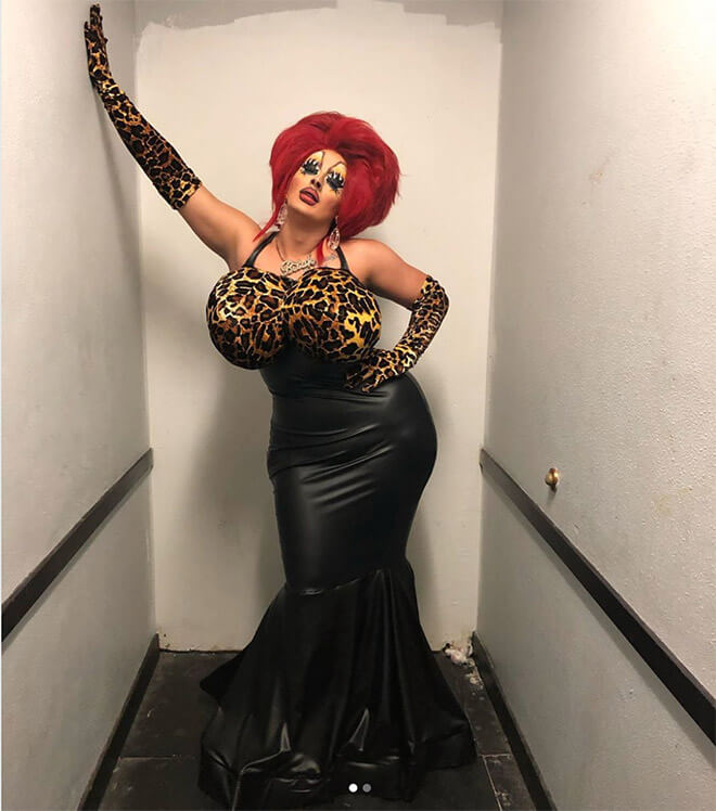 Drag Queen in small room dressDrag Queen in small room dressed in leopard printed in leopard print