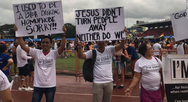 gay pride signs that read i used to be a bible banging homophobe sorry