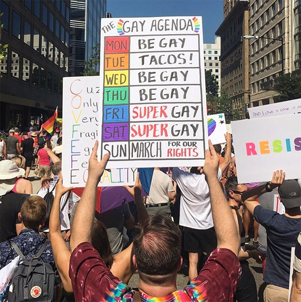 Gay pride sign that says gay agenda