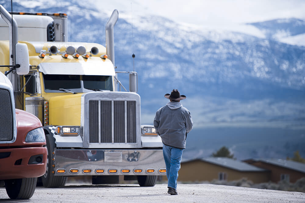 Trucker with truck looking for truck dispatch services
