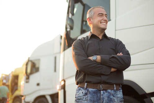 trucker crossed arms happy secured with insurance