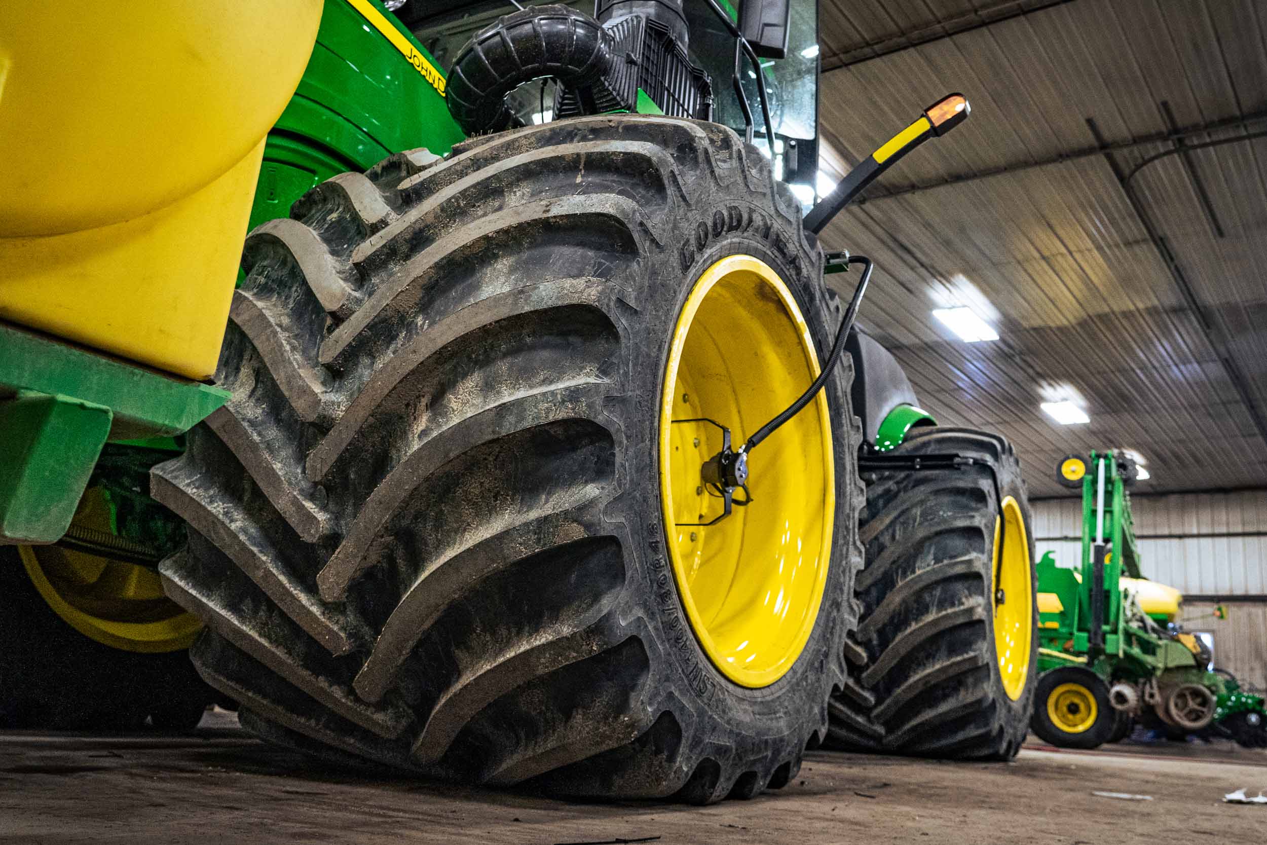A John Deere 4WD tractor with Goodyear LSW 1400/30R46 super single tires and PTG central tire inflation system.