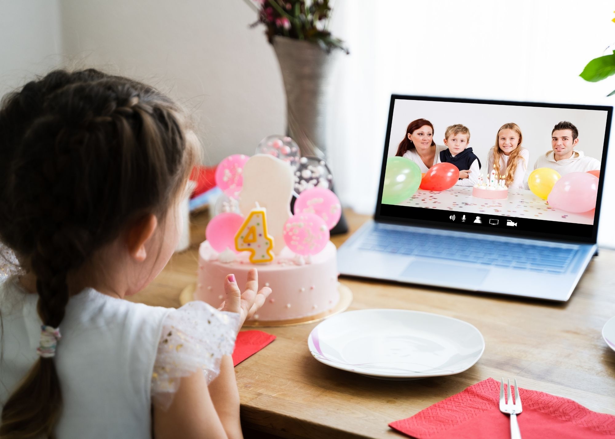 little girl watching birthday video