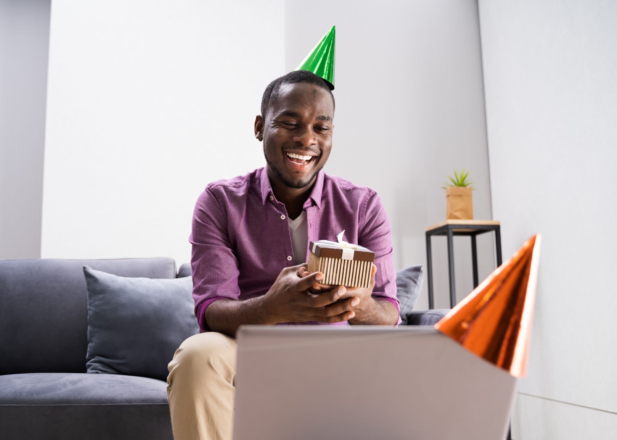 man watching birthday video