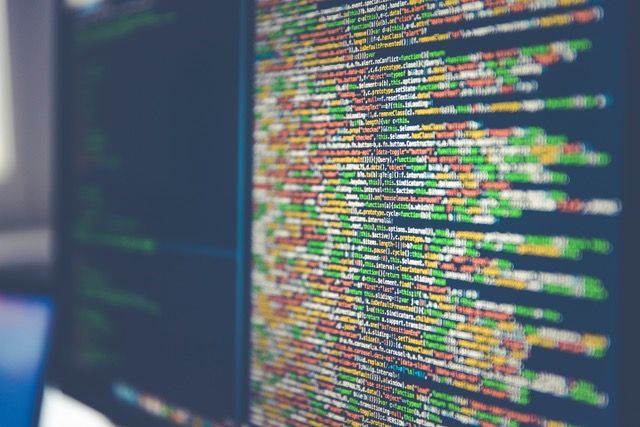 Computer monitor showing lines of code.