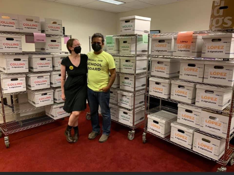 Autumn Looijen & Siva Raj with the nearly 240,000 signatures delivered to the Dept of Elections.