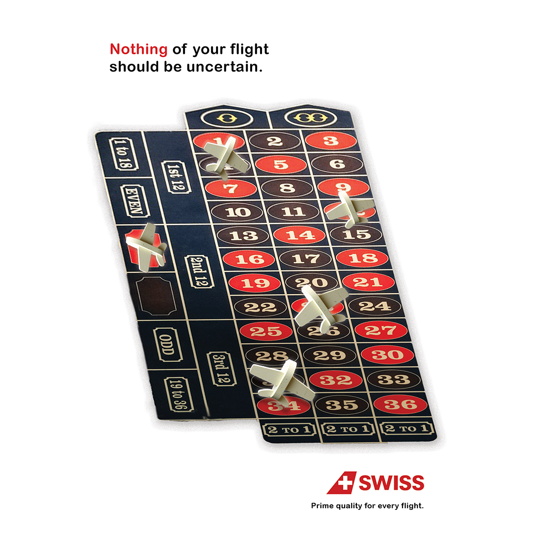 An advertisement showing toy airplaces on a roulette table with the caption reading Nothing ofYour Flight Should Be Uncertain. SwissAir