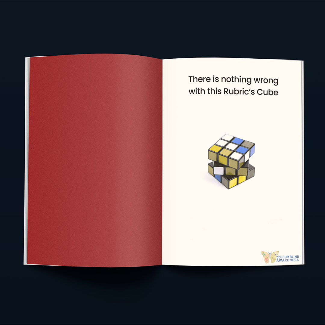 A magazine ad for Colour Blind Awareness. A rubics cube sits in the centre of the page, but the colours on the cube are muted shades of green and blue. The text at the top of the page reads "There is nothing wrong with this Rubric's Cube."