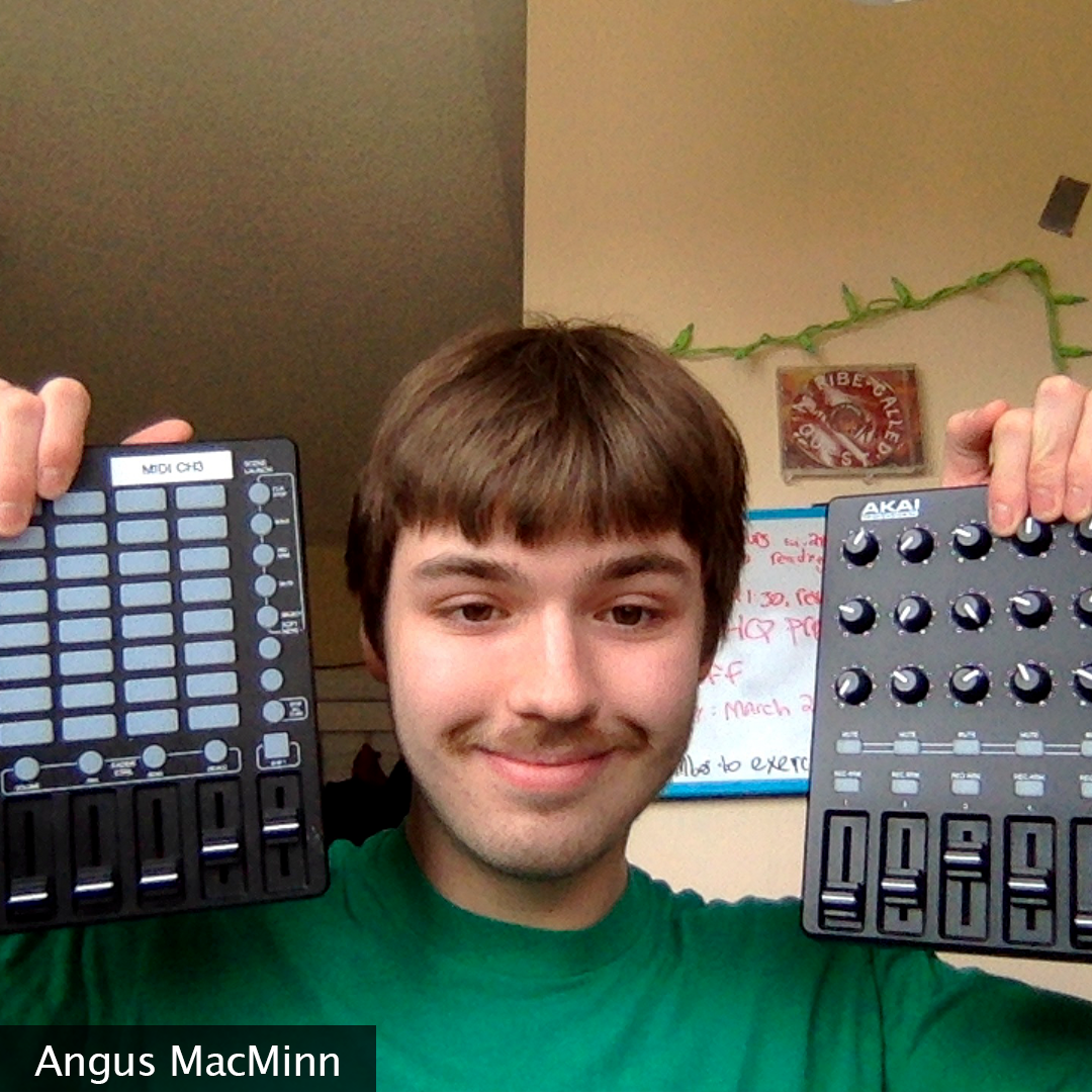 Picture of Angus MacMinn, holding up 2 MIDI controllers next to his head