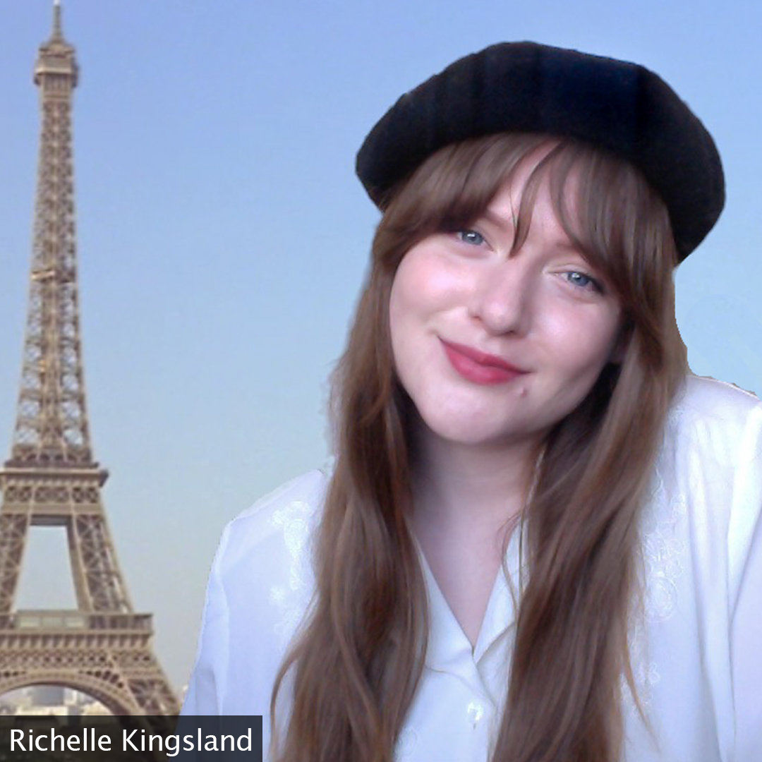 Picture of Richelle Kingsland wearing a beret with an Eiffel Tower Zoom background.