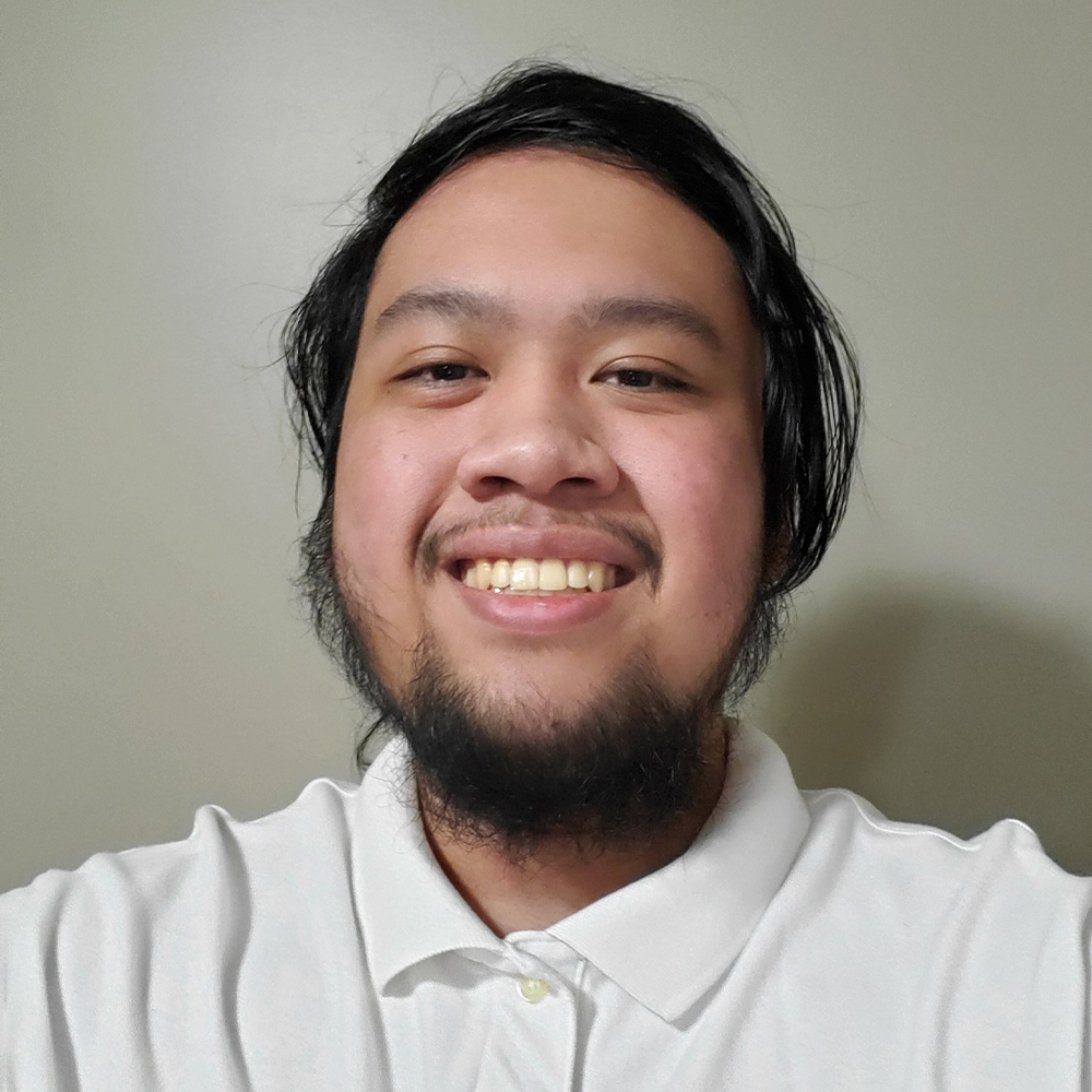 Picture of Fidel David wearing white polo