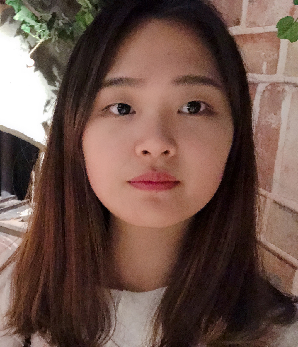 Picutre of Hena Cho wearing a white t-shirt