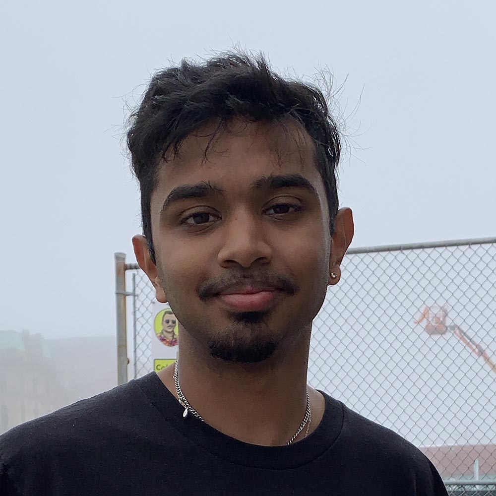 Picture of Josiah outdoors wearing a black t-shirt