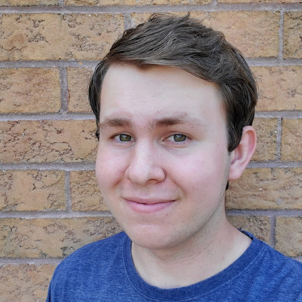 Picture of Mackenzie, wearing a blue shirt