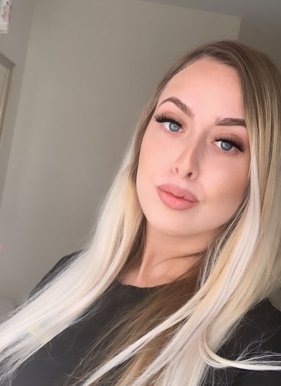 Picture of Stephanie, wearing a black shirt