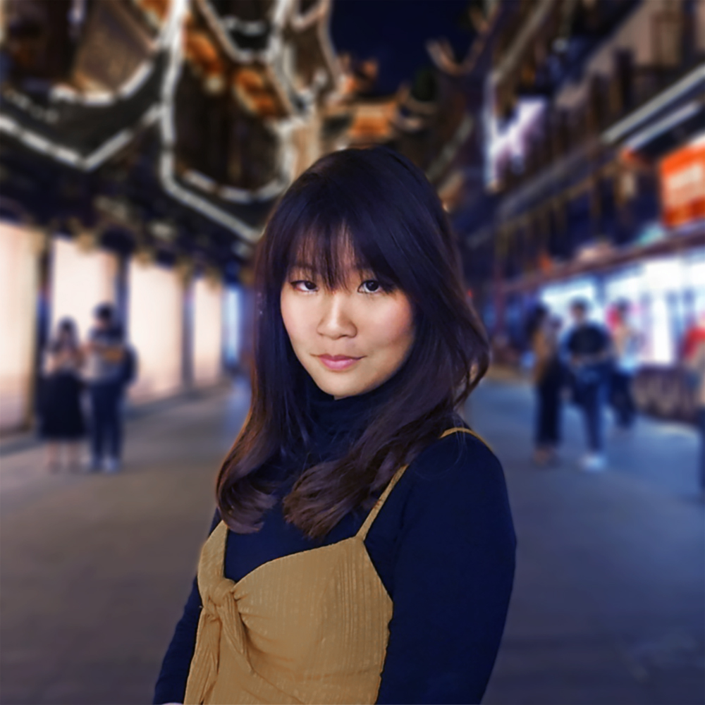Picture of Agnes wearing a brown dress and a black shirt