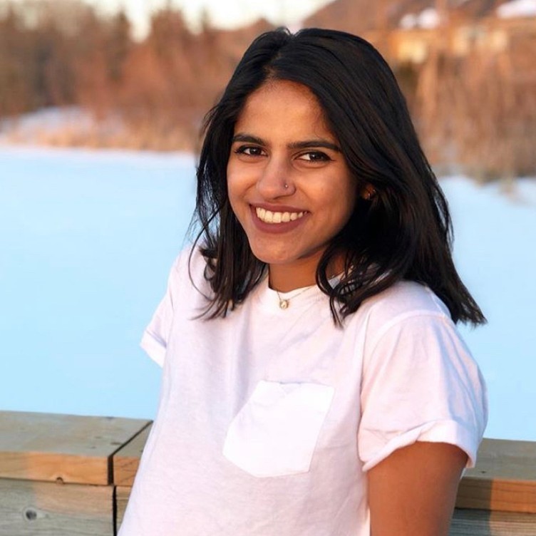 Picture of Arifa, outdooer wearing a white blouse