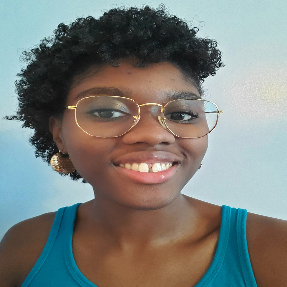 Picture of Bianka Fullwood, wearing a blue tank top