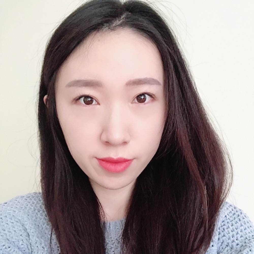 Picture of Jeongah wearing a grey shirt