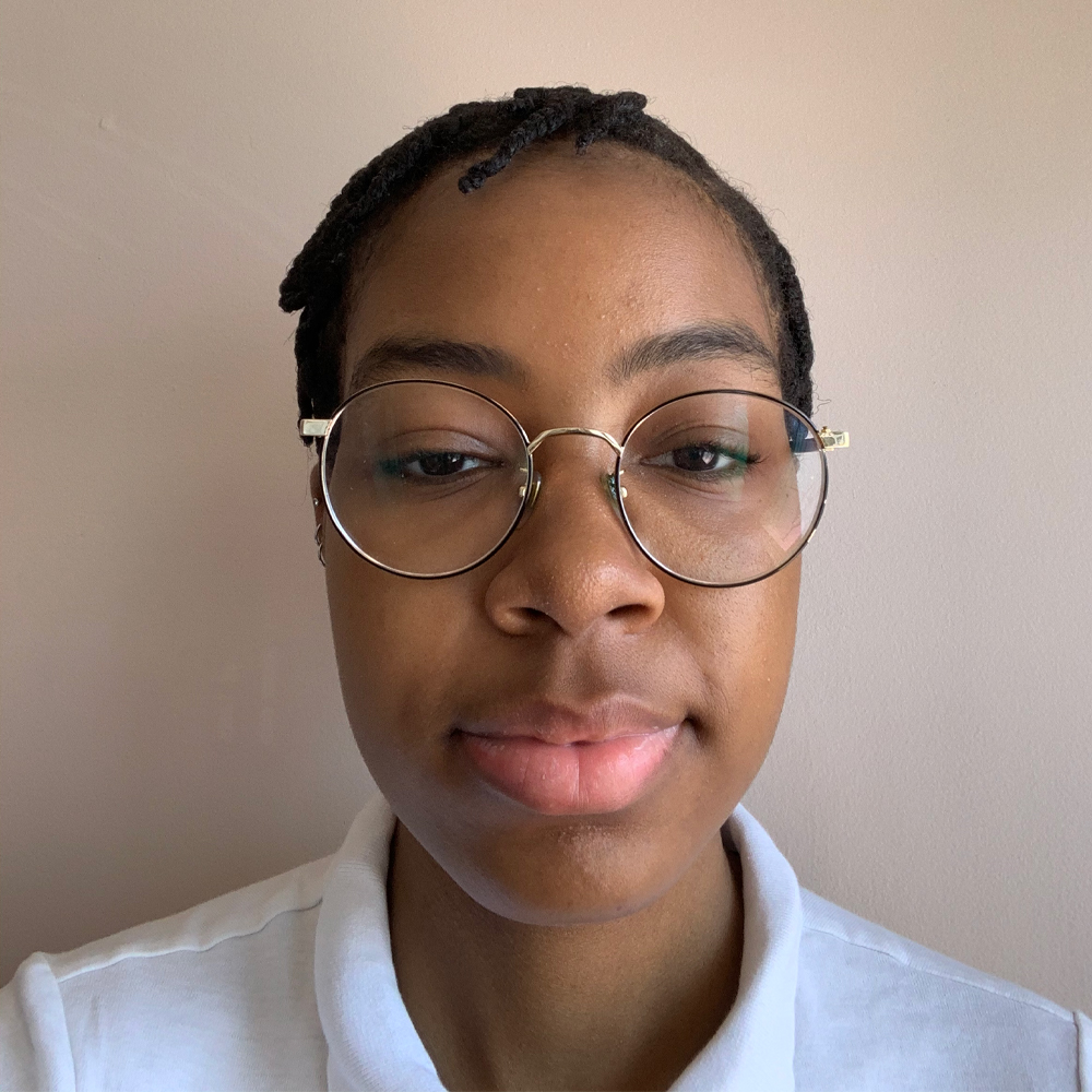 Picture of Tayzia Brown wearing a white shirt