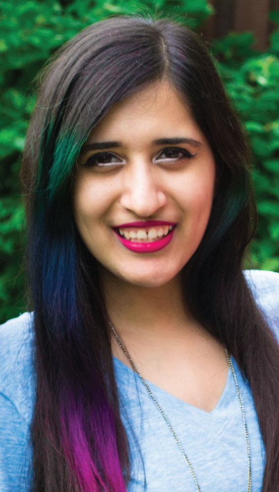 Picture of Umnia, outdoors wearing a blue shirt