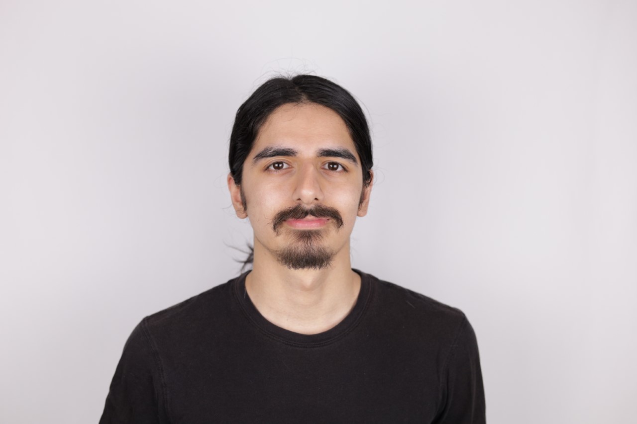 A portrait headshot of Aryan Khandan