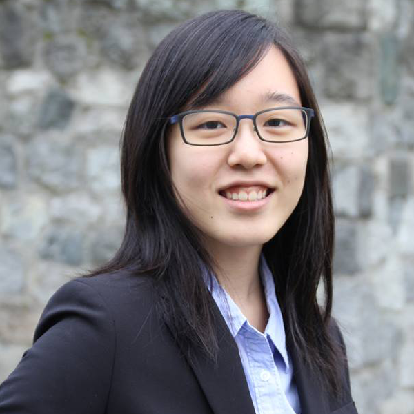 A photo of the artist, an East Asian woman, smiling at the camera