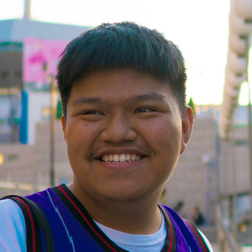 A picture of Luisito smiling for the camera.