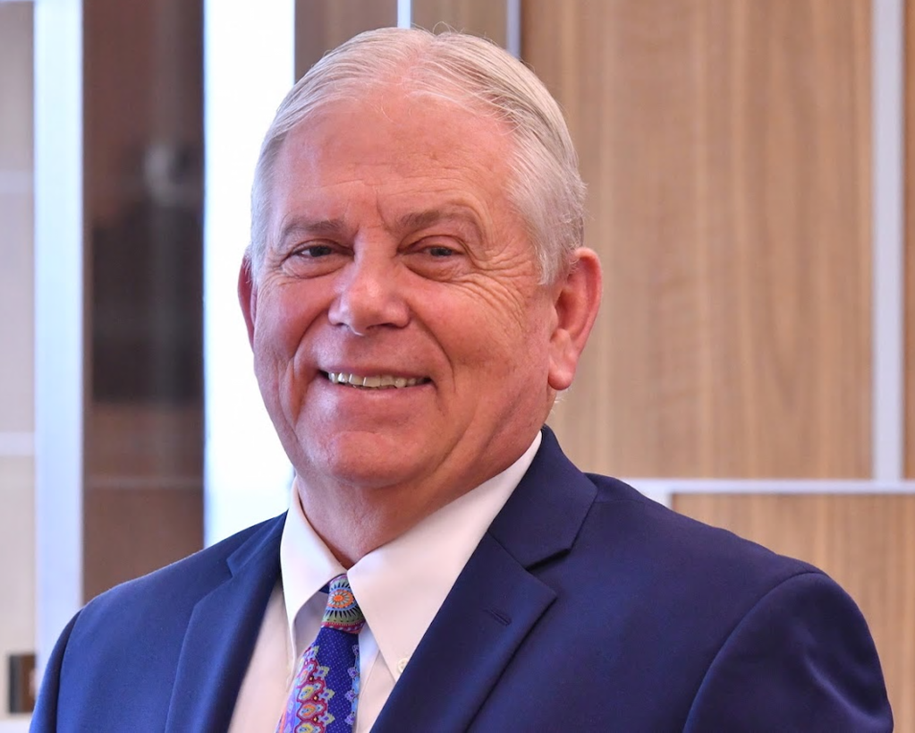 A photo of Jay Francis, Former Executive Vice President of the Larry H. Miller Group of Companies.