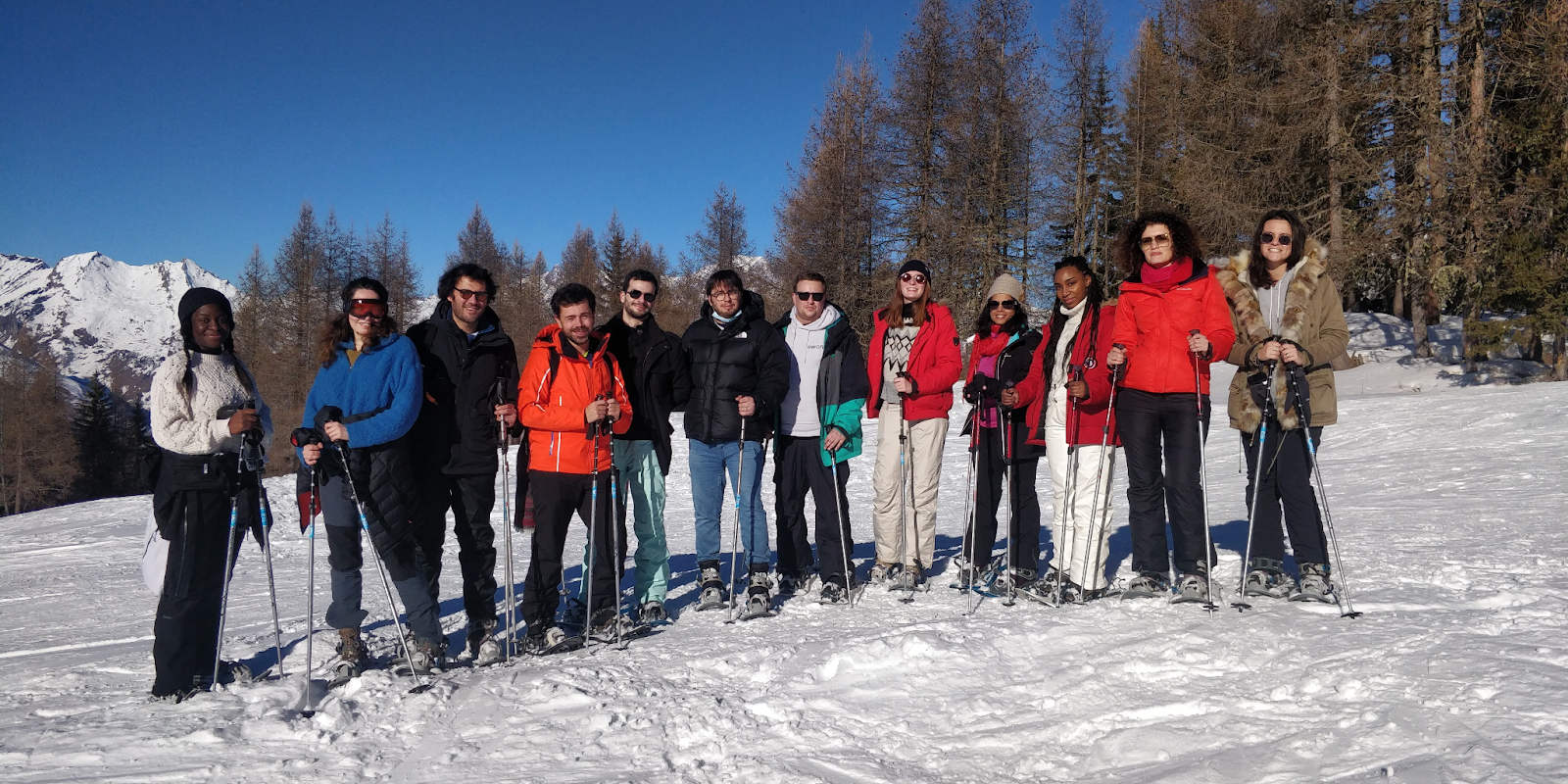 Part of Swan's growing European team, on a mountaintop.