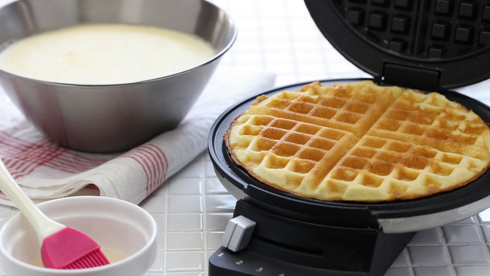 making homemade waffle on wafflemaker