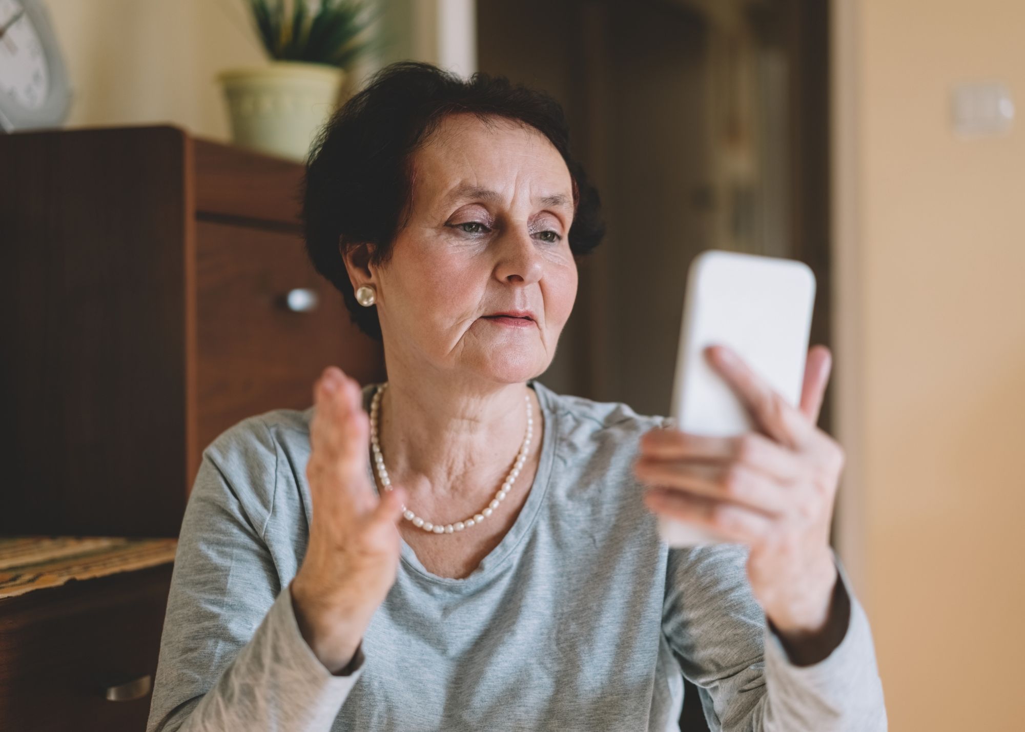 woman recording video on phone