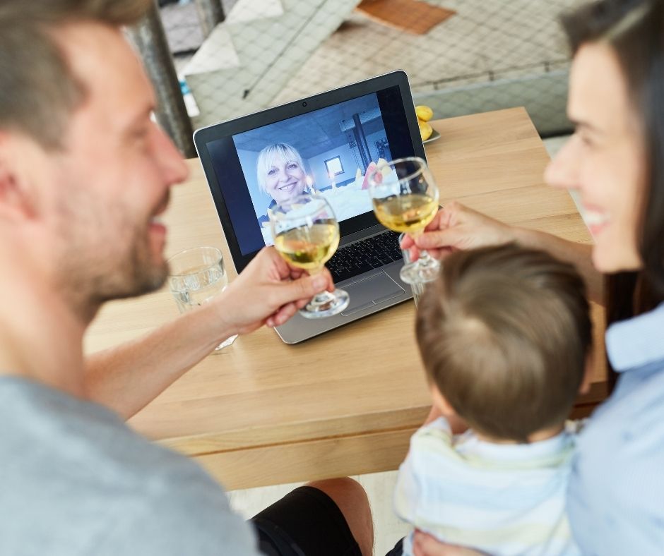 young couple celebrating anniversary watching video