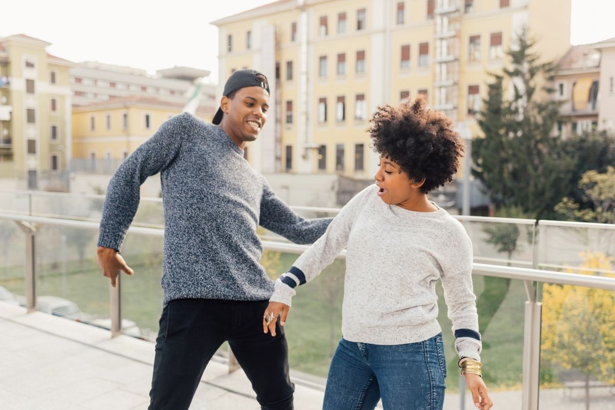 couple in street, dancing