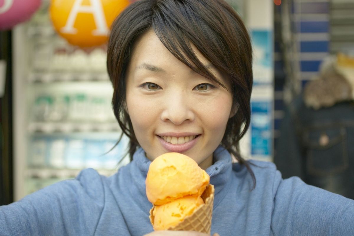 woman eating sherbert