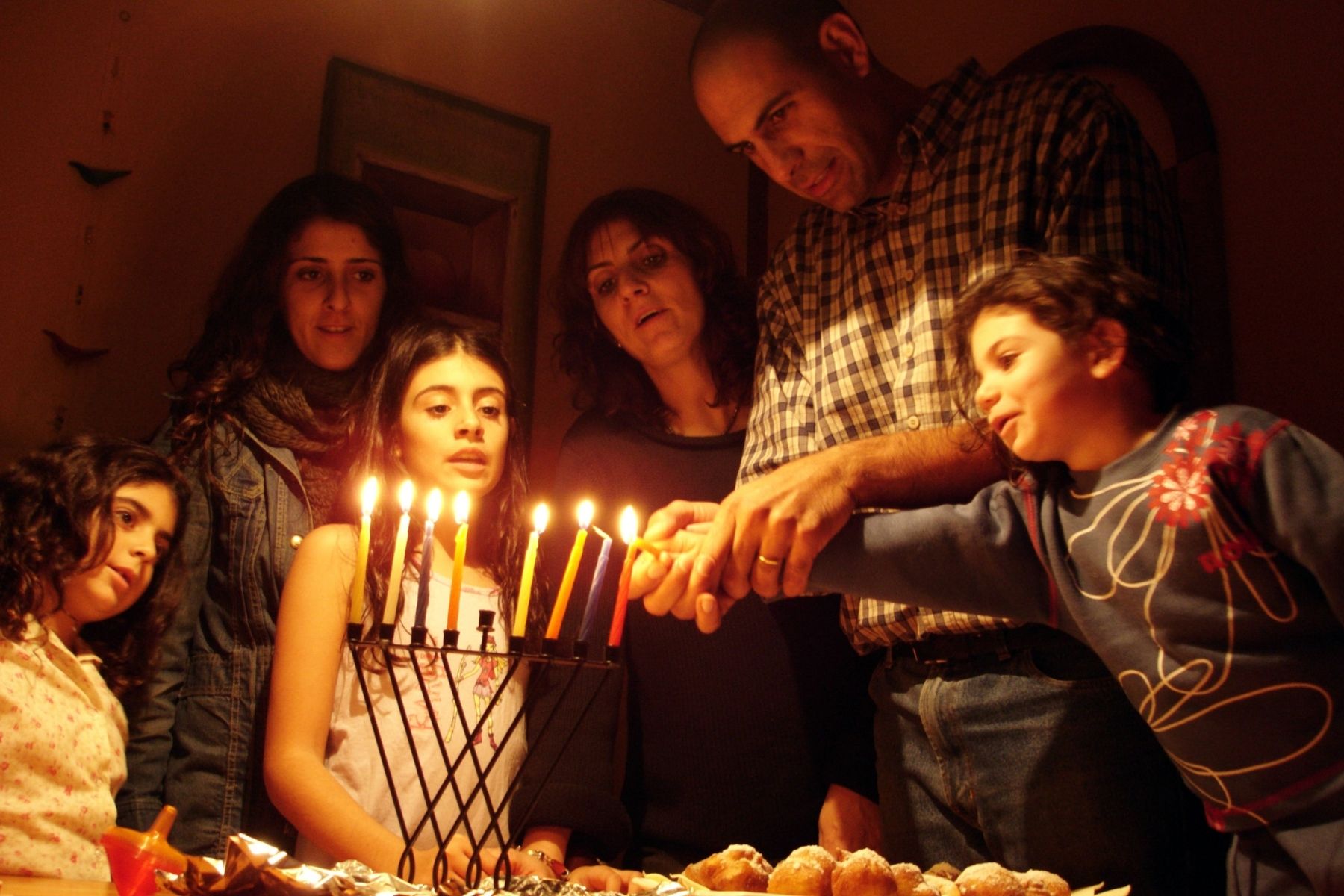 Family celebrating Hanukkah