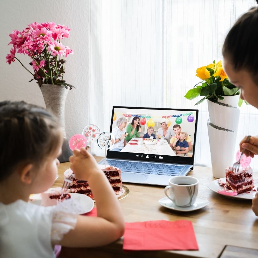 Little girl watching birthday group video