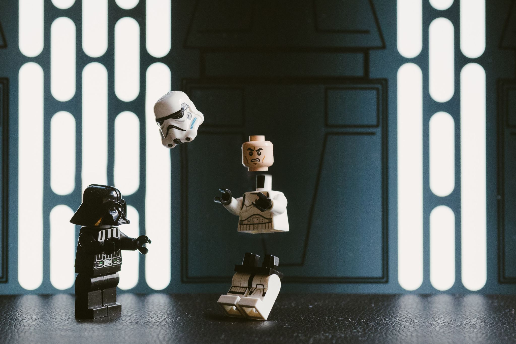 Lego Star Wars Stormtrooper being pulled apart by Darth Vader