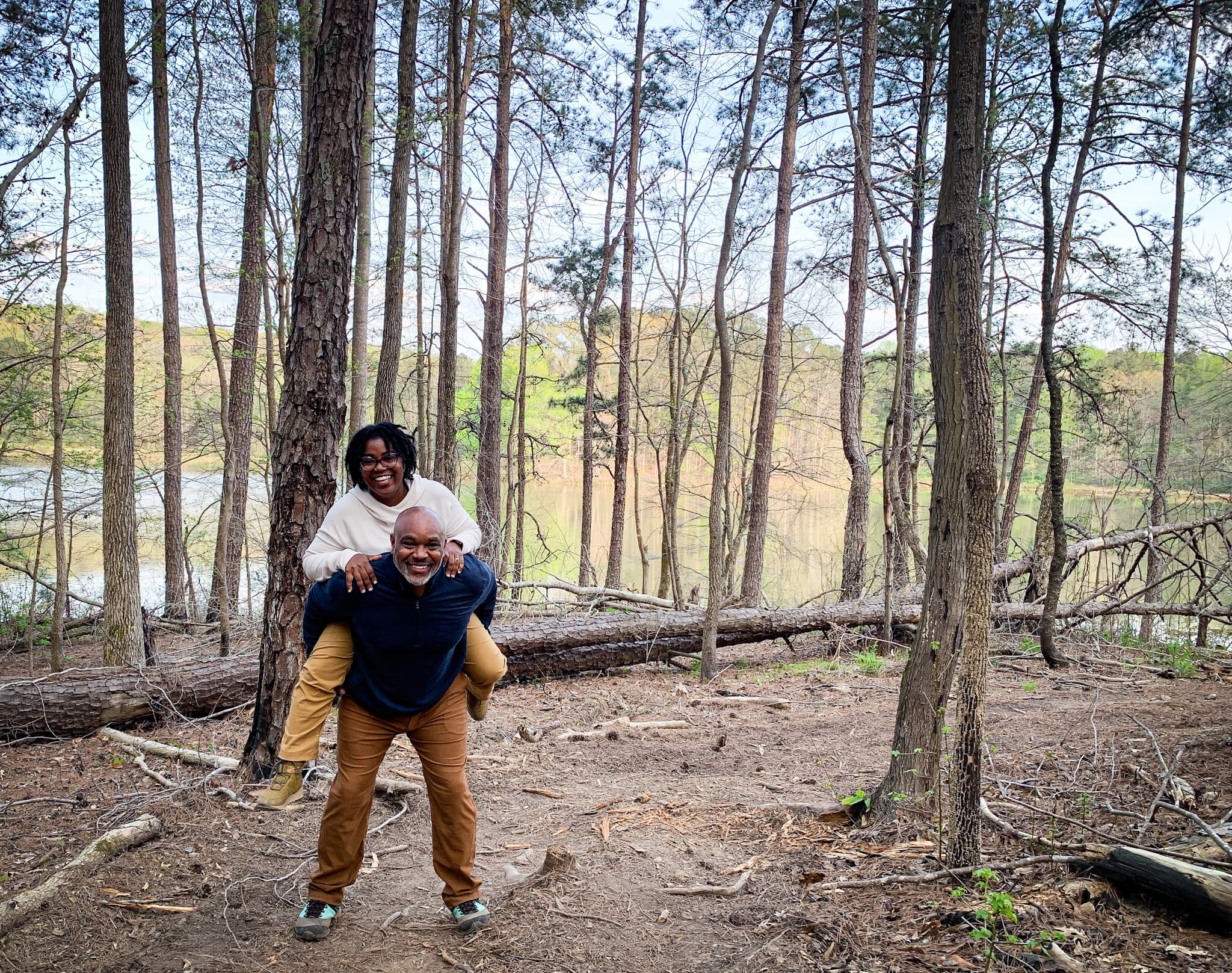 Couple smiling in forest