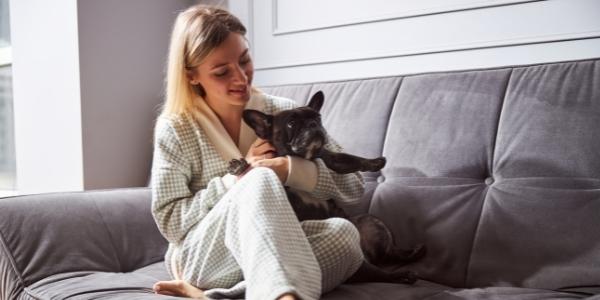 lady with her dog in apartment