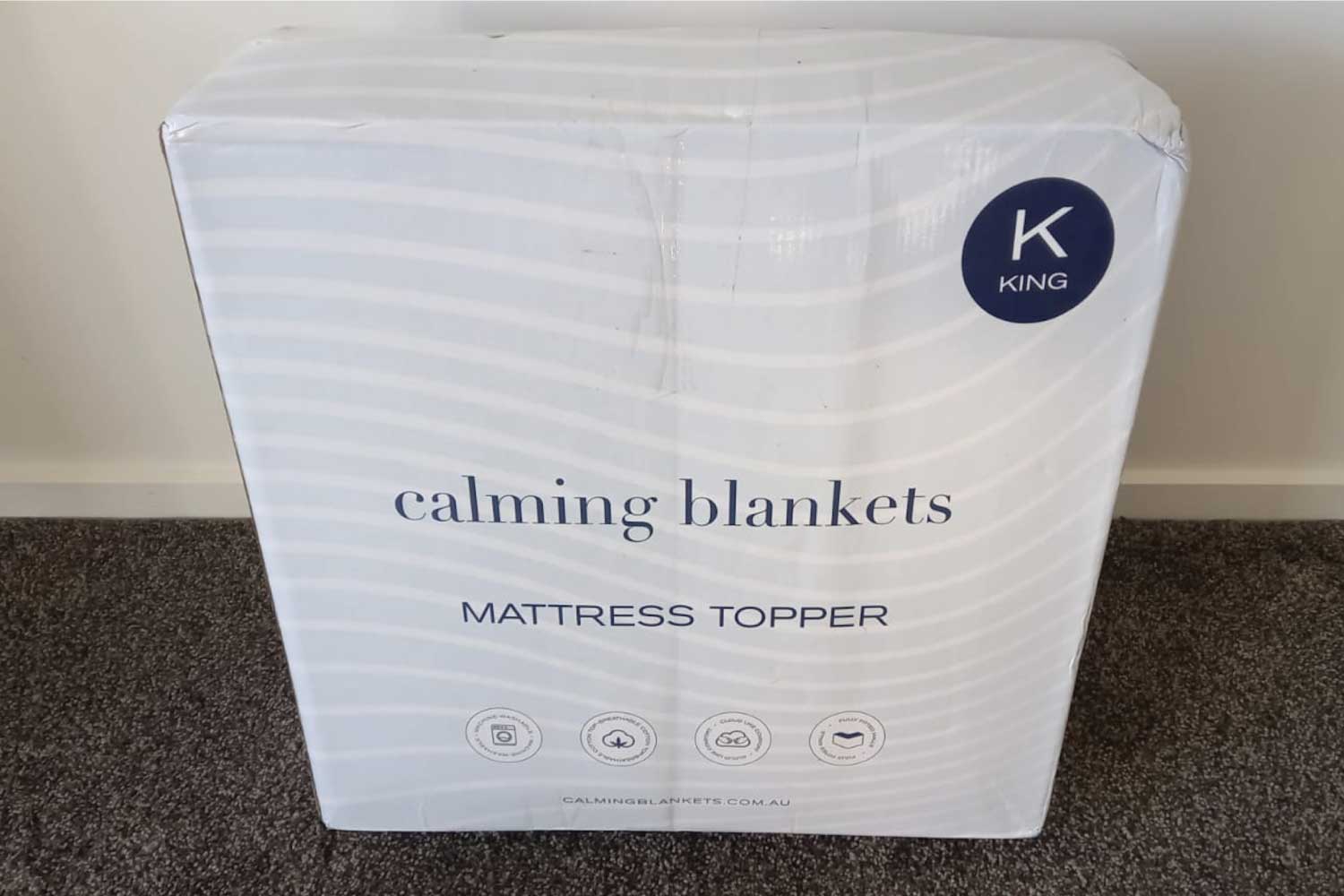 Calming Blankets mattress topper in box