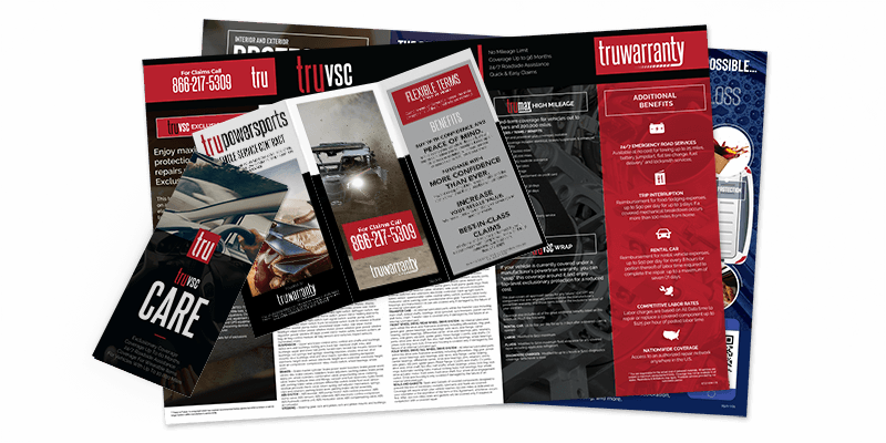 Smattering of TruWarranty's print materials: brochures, one pagers, desk mats.