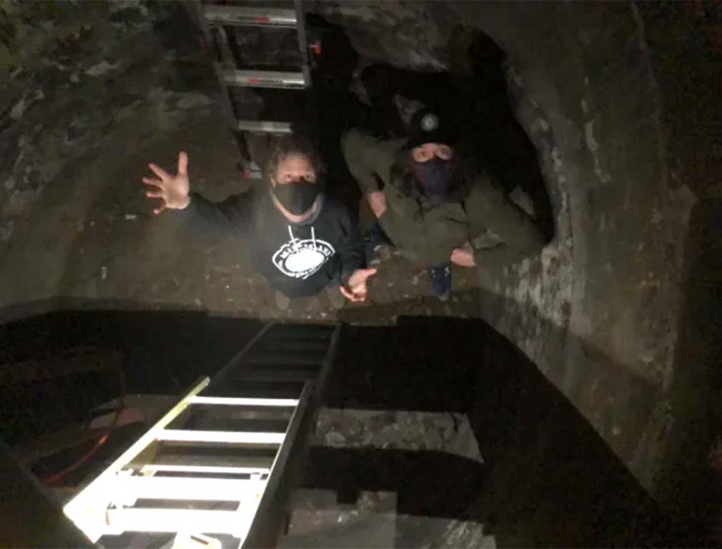 A cistern with founders Kent and Ryan, just below our First Street Taphouse.