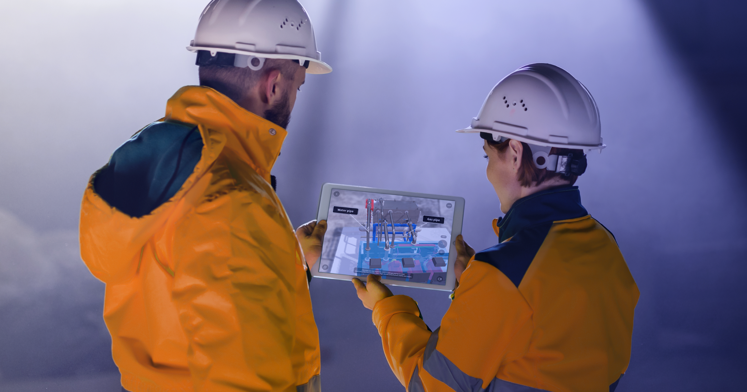 Two construction workers using an AR presentation to learn a process remotely