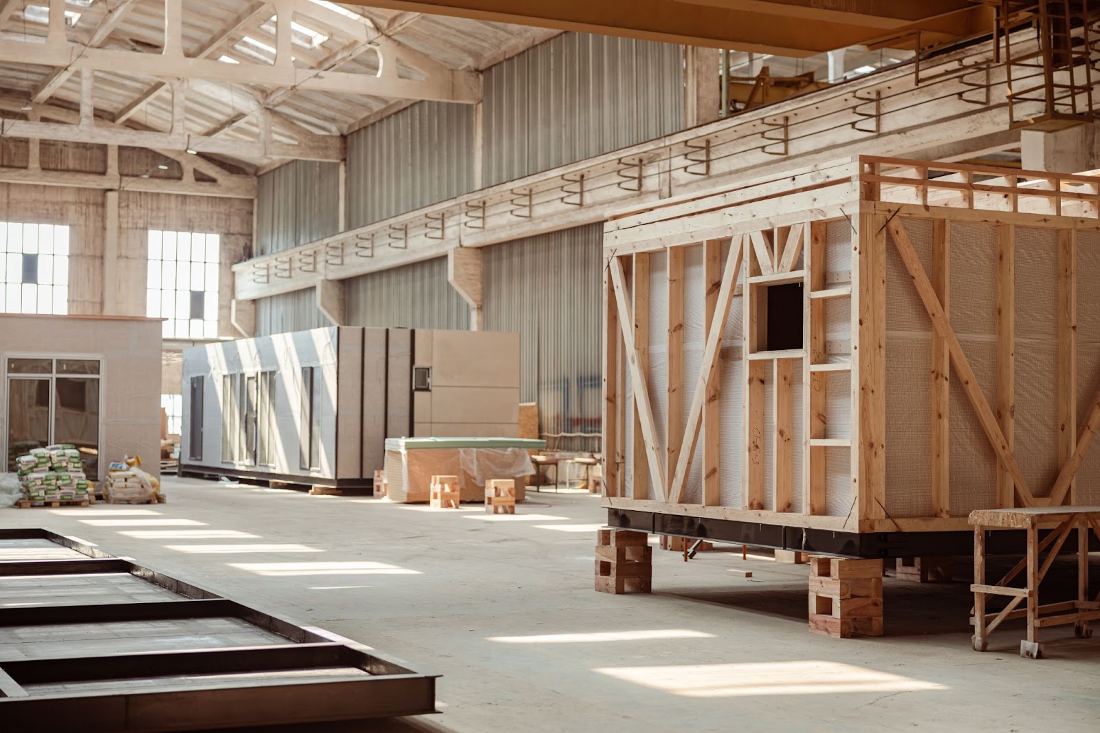 Timber frames and elements prefabricated in a factory setting