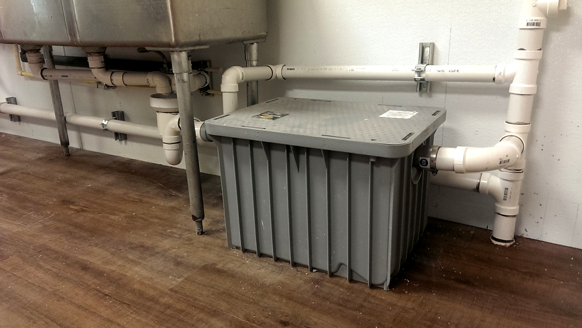 Choosing The Right Plumber For Commercial Grease Trap Installation