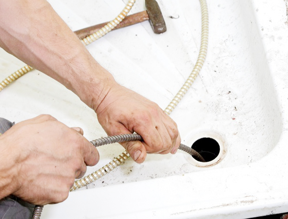 How To Clean A Bathtub Drain Hero Plumbing